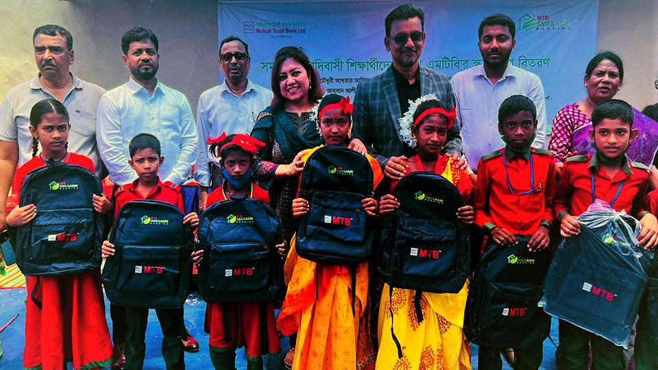 MTB distributes school bags to students in Naogaon